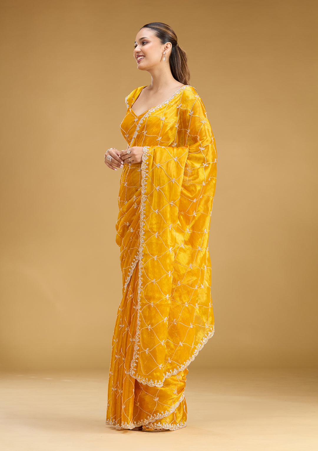 Yellow Tissue Cutdana Saree With Matching Blouse Piece