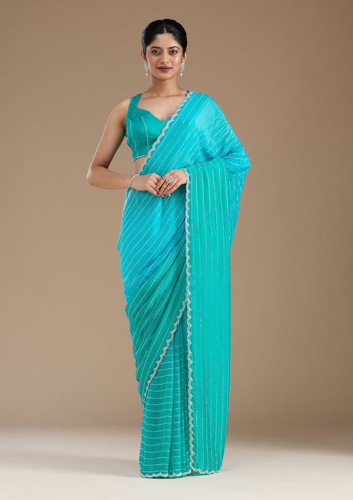 Blue Satin Cutdana Saree With Matching Blouse Piece