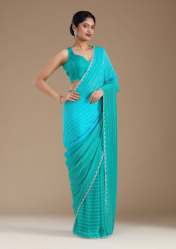 Blue Satin Cutdana Saree With Matching Blouse Piece