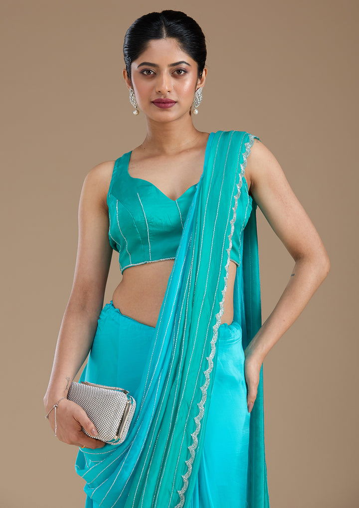 Blue Satin Cutdana Saree With Matching Blouse Piece