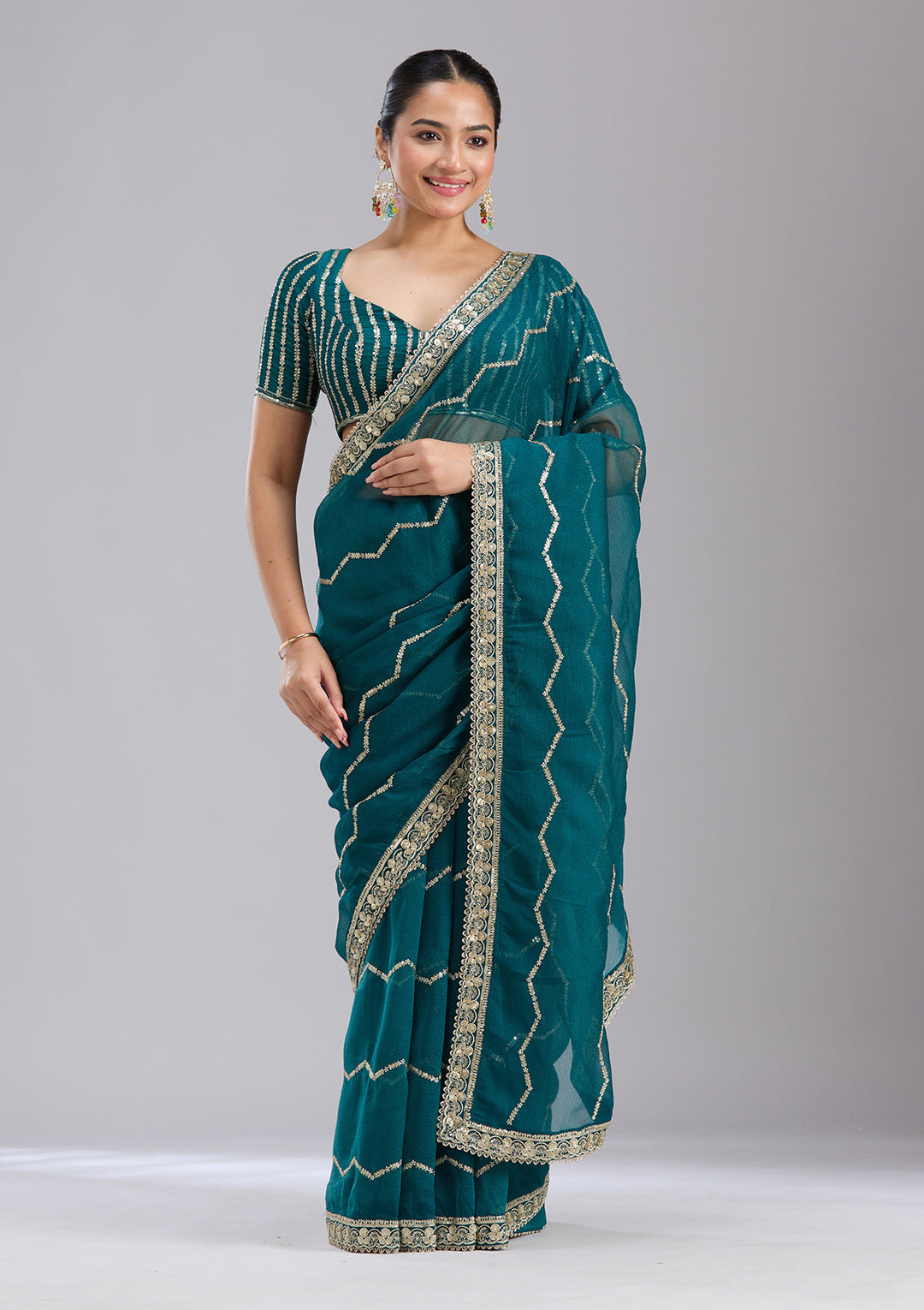 Peacock Blue Sequins Georgette Saree