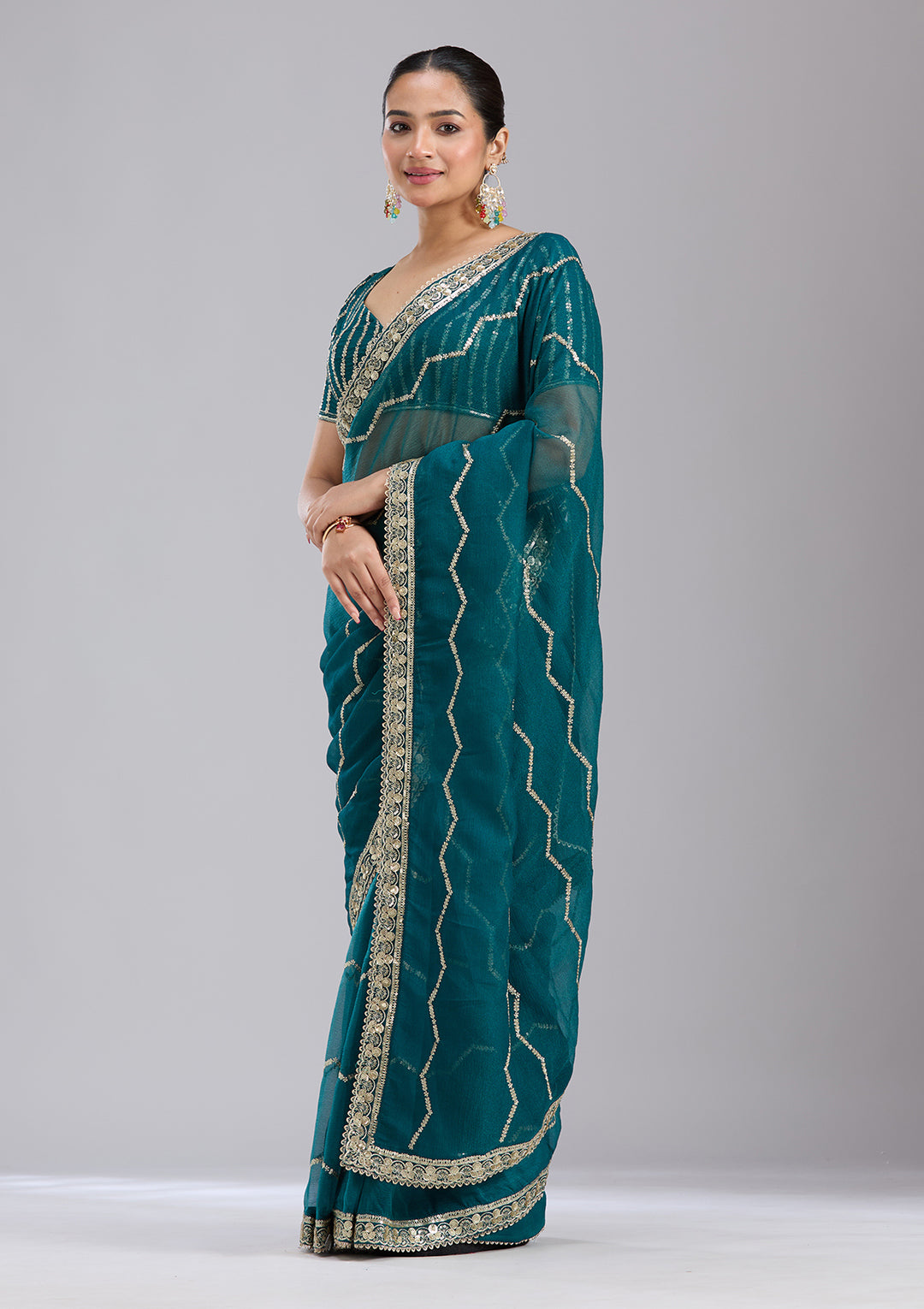 Peacock Blue Sequins Georgette Saree