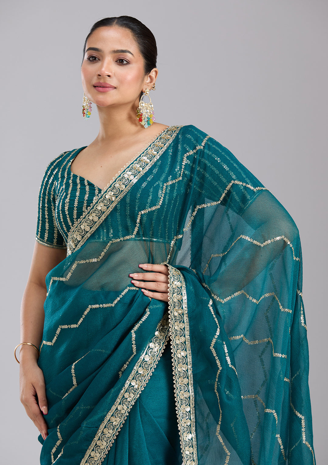 Peacock Blue Sequins Georgette Saree