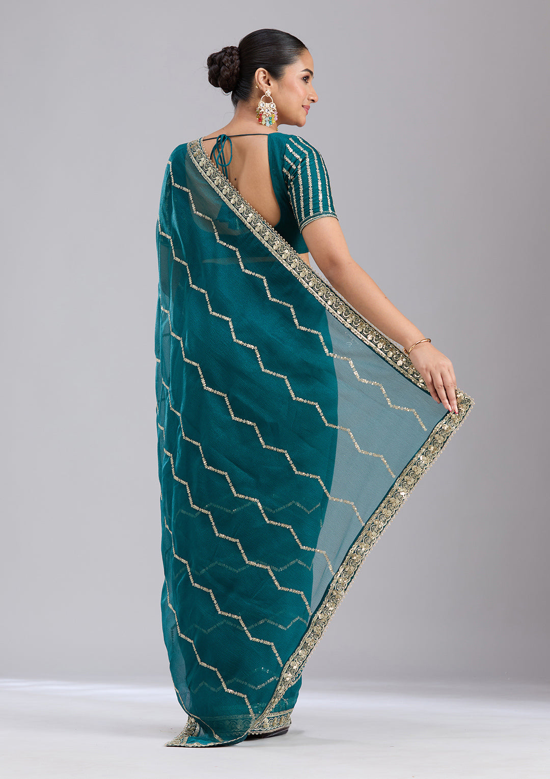 Peacock Blue Sequins Georgette Saree