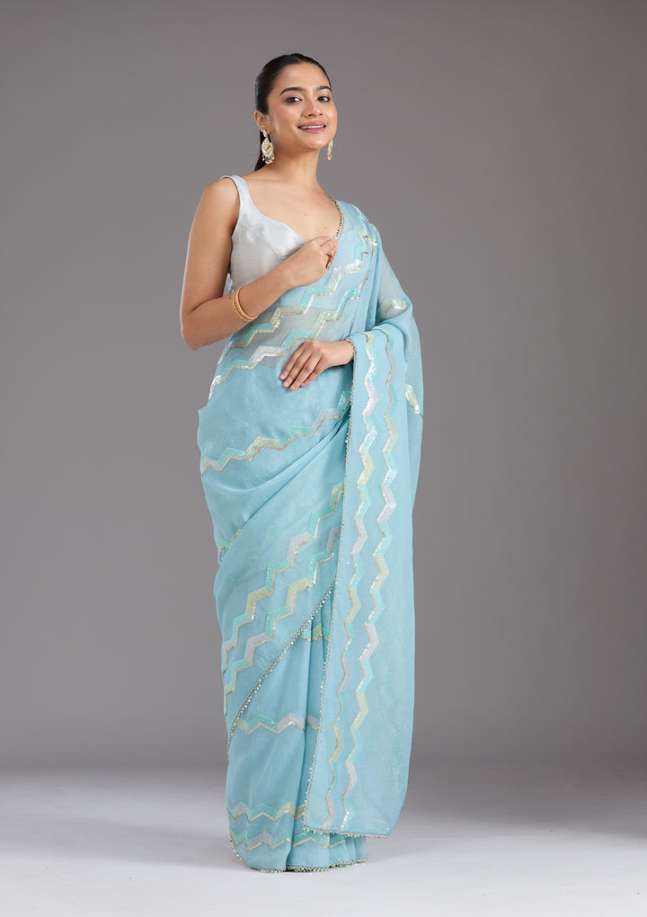 Sky Blue Sequins Semi Crepe Saree
