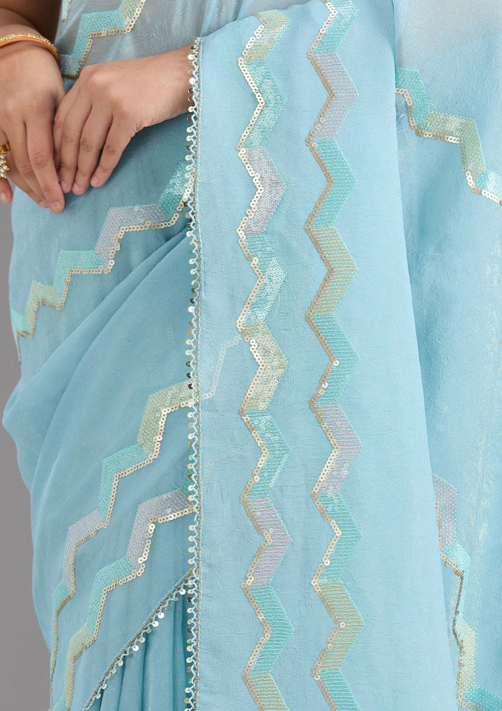 Sky Blue Sequins Semi Crepe Saree