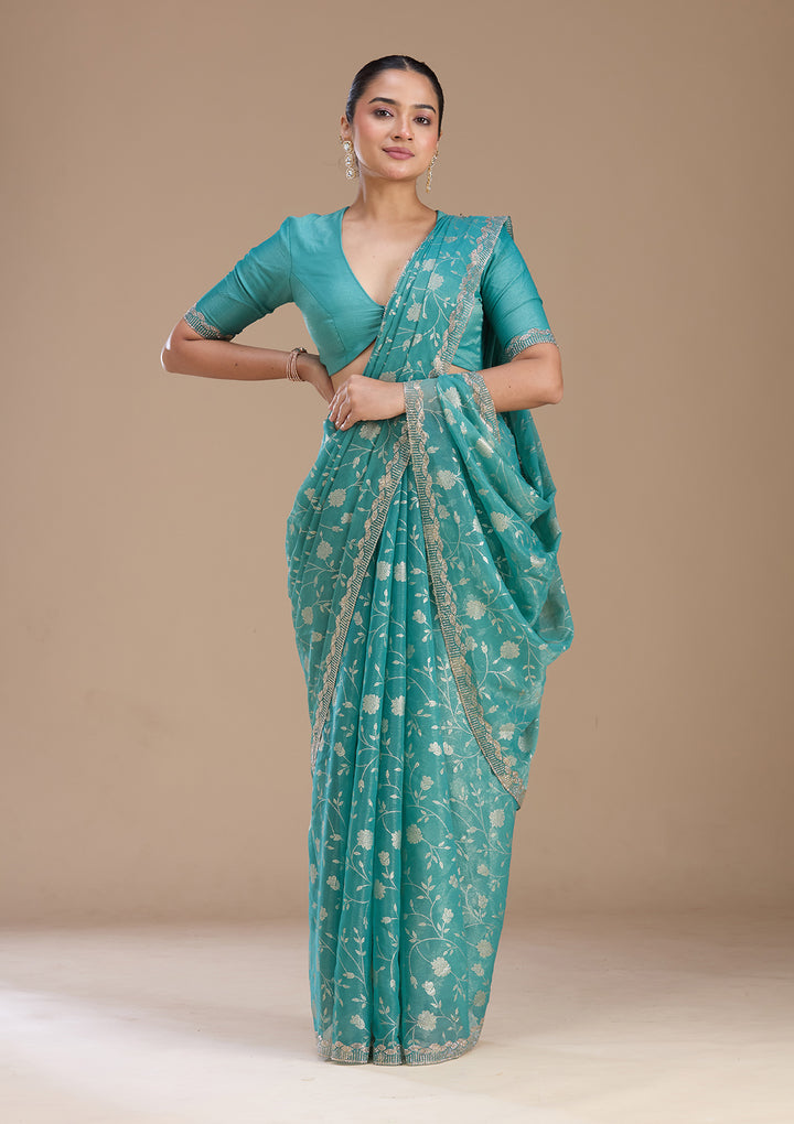 Sea Green Tissue Floral Badla Saree With Matching Blouse Piece