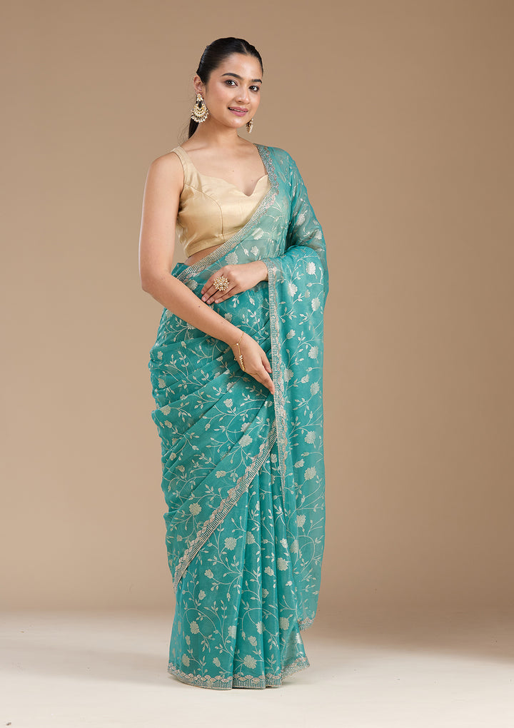 Sea Green Tissue Floral Badla Saree With Matching Blouse Piece