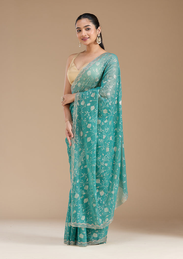 Sea Green Tissue Floral Badla Saree With Matching Blouse Piece