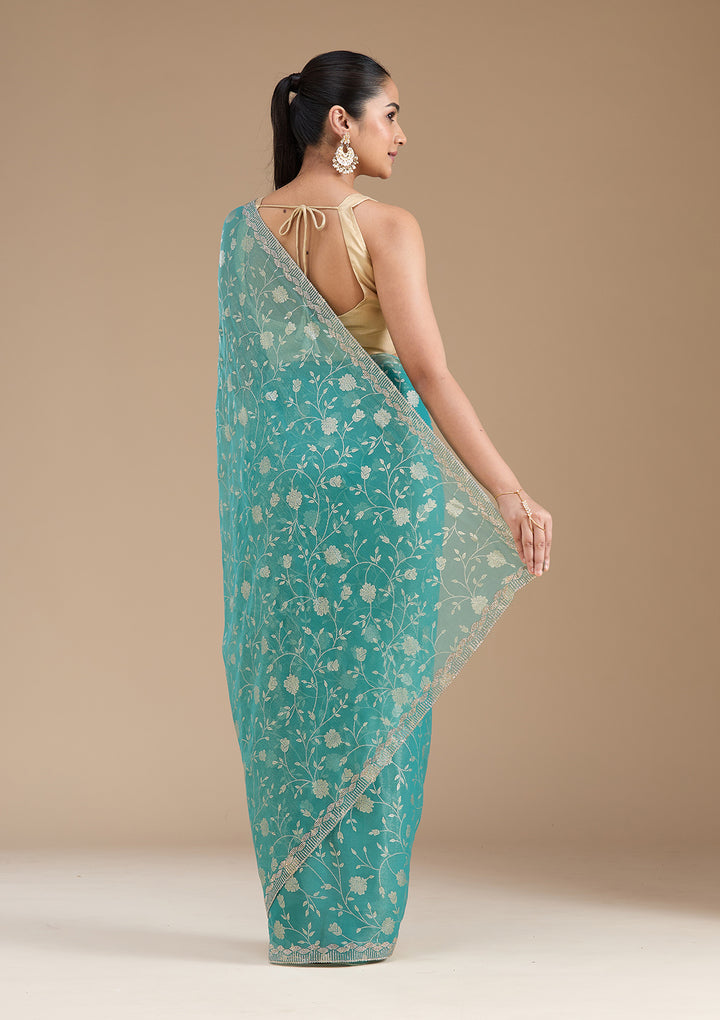 Sea Green Tissue Floral Badla Saree With Matching Blouse Piece