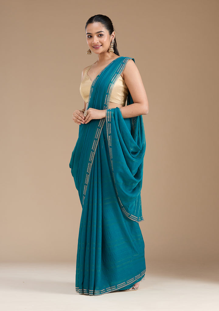 Peacock Blue Chiffon Gold Stonework Saree With Matching Blouse Piece