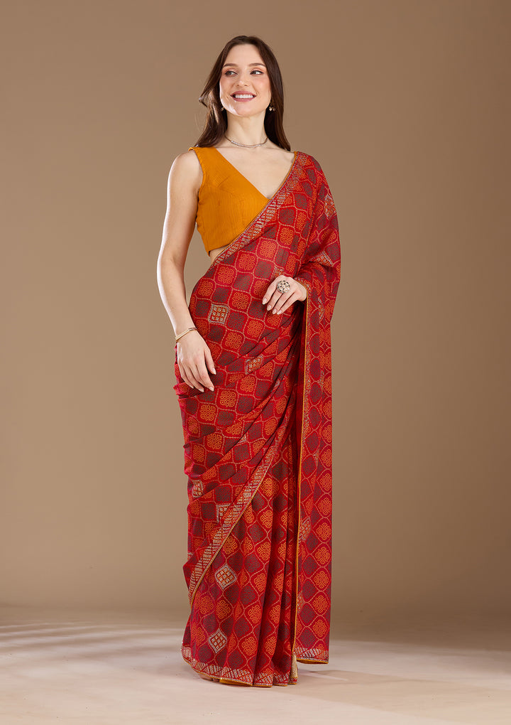 Red Georgette Bandhej Gold Stonework Saree With Matching Blouse Piece