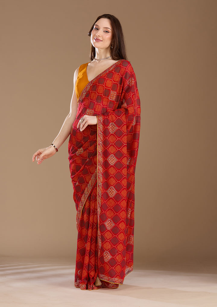 Red Georgette Bandhej Gold Stonework Saree With Matching Blouse Piece