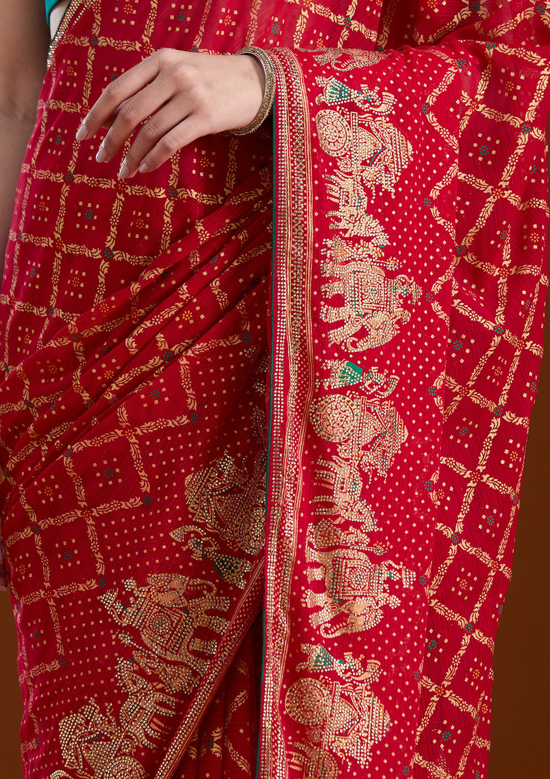 Red Georgette Bandhej Gold Stonework Saree With Matching Blouse Piece
