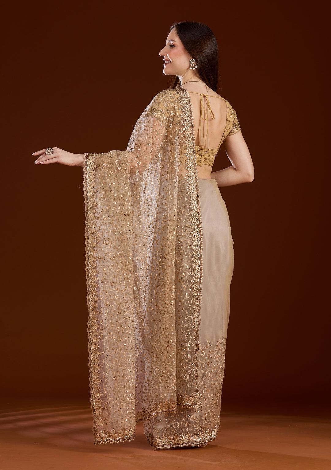 Gold Net Sequins Saree With Matching Blouse Piece