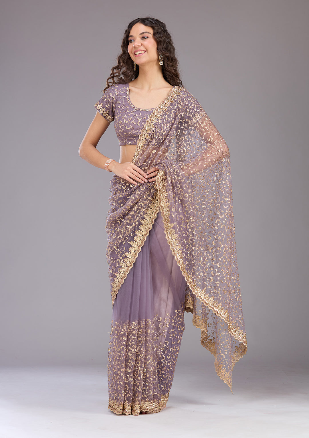 Lavender Net Sequins Saree With Matching Blouse Piece