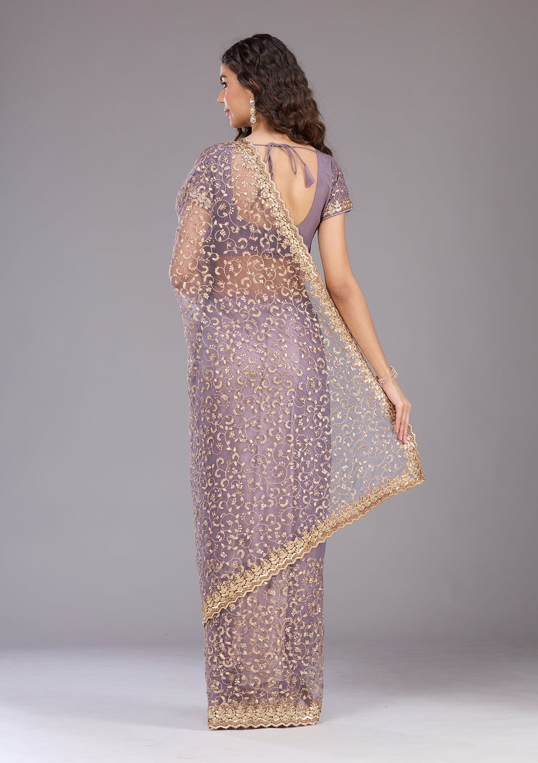 Lavender Net Sequins Saree With Matching Blouse Piece