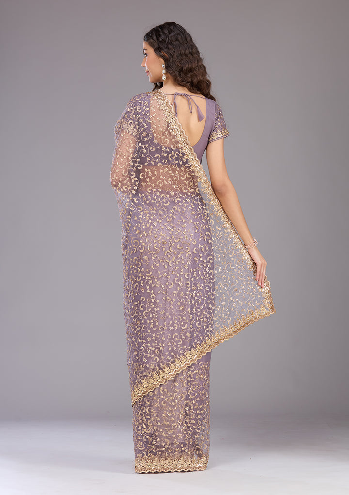 Lavender Net Sequins Saree With Matching Blouse Piece