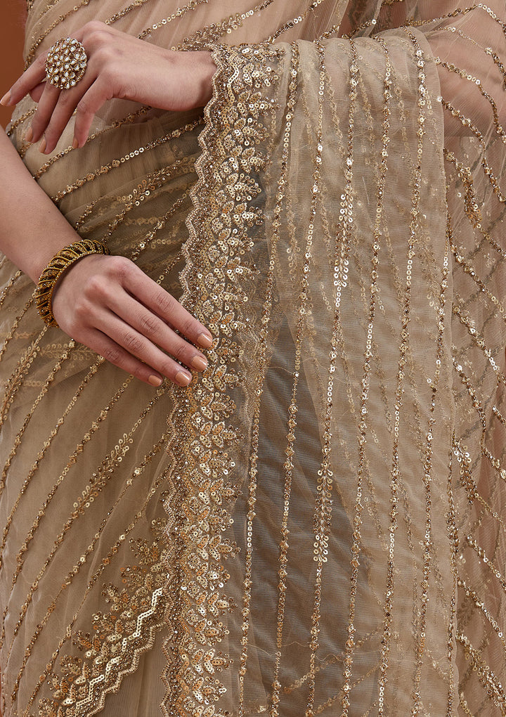 Beige Net Sequins Saree With Matching Blouse Piece