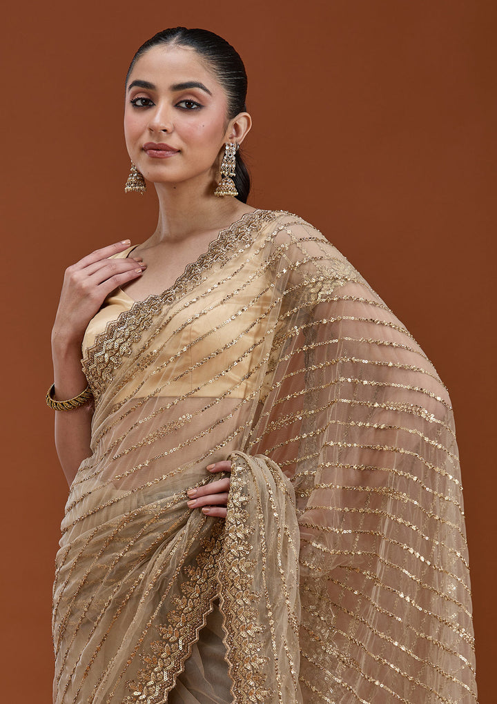 Beige Net Sequins Saree With Matching Blouse Piece