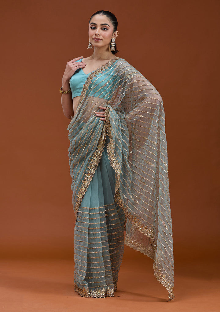 Sea Green Sequins Net Saree