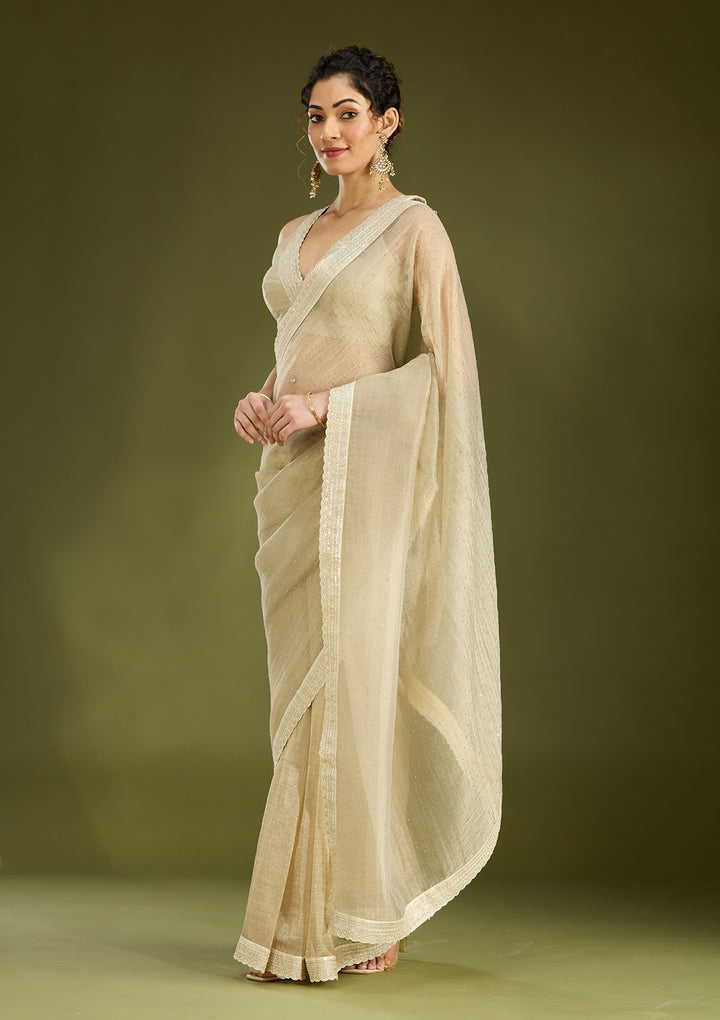 Beige Tissue Gold Zariwork Saree With Matching Blouse Piece