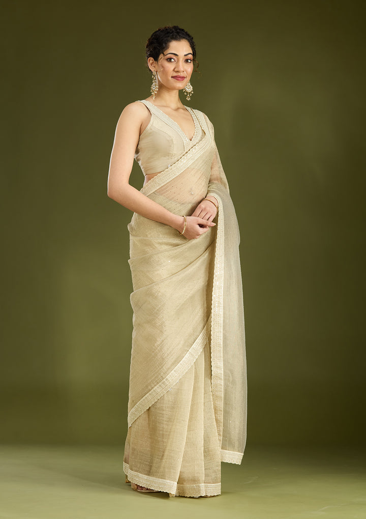 Beige Tissue Gold Zariwork Saree With Matching Blouse Piece