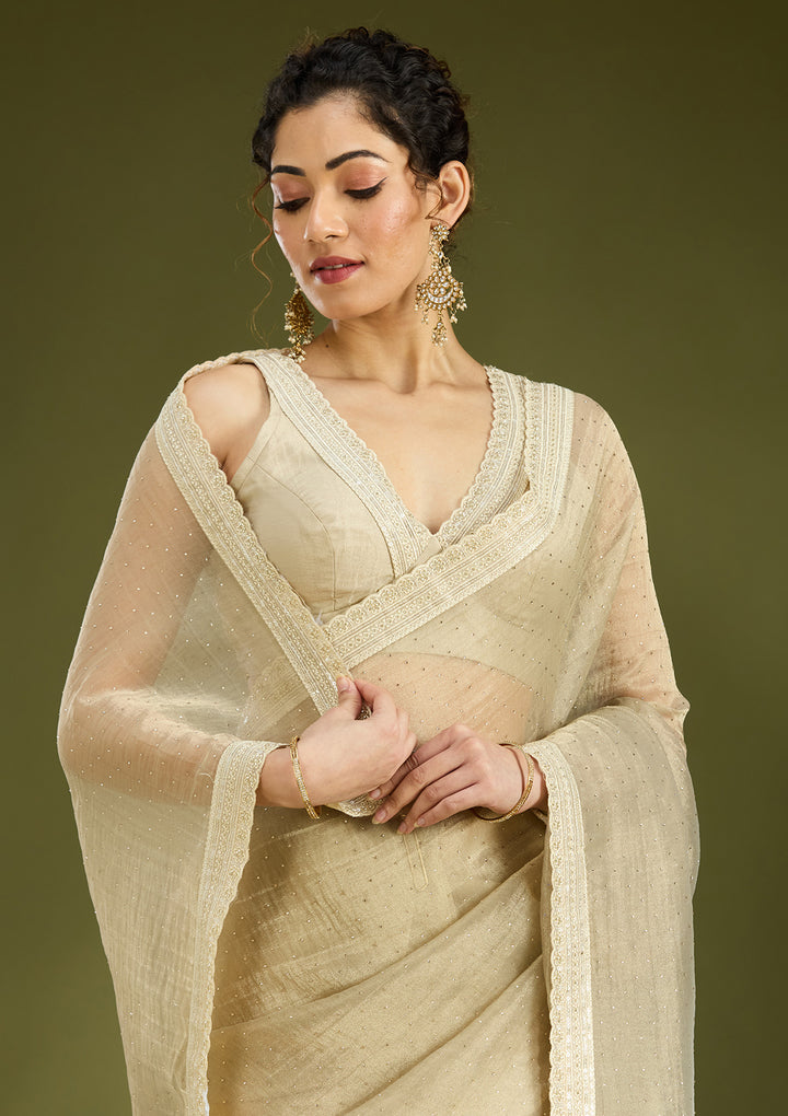 Beige Tissue Gold Zariwork Saree With Matching Blouse Piece