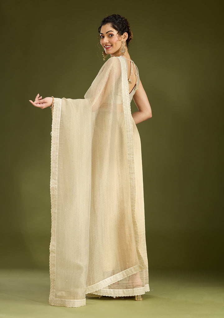 Beige Tissue Gold Zariwork Saree With Matching Blouse Piece