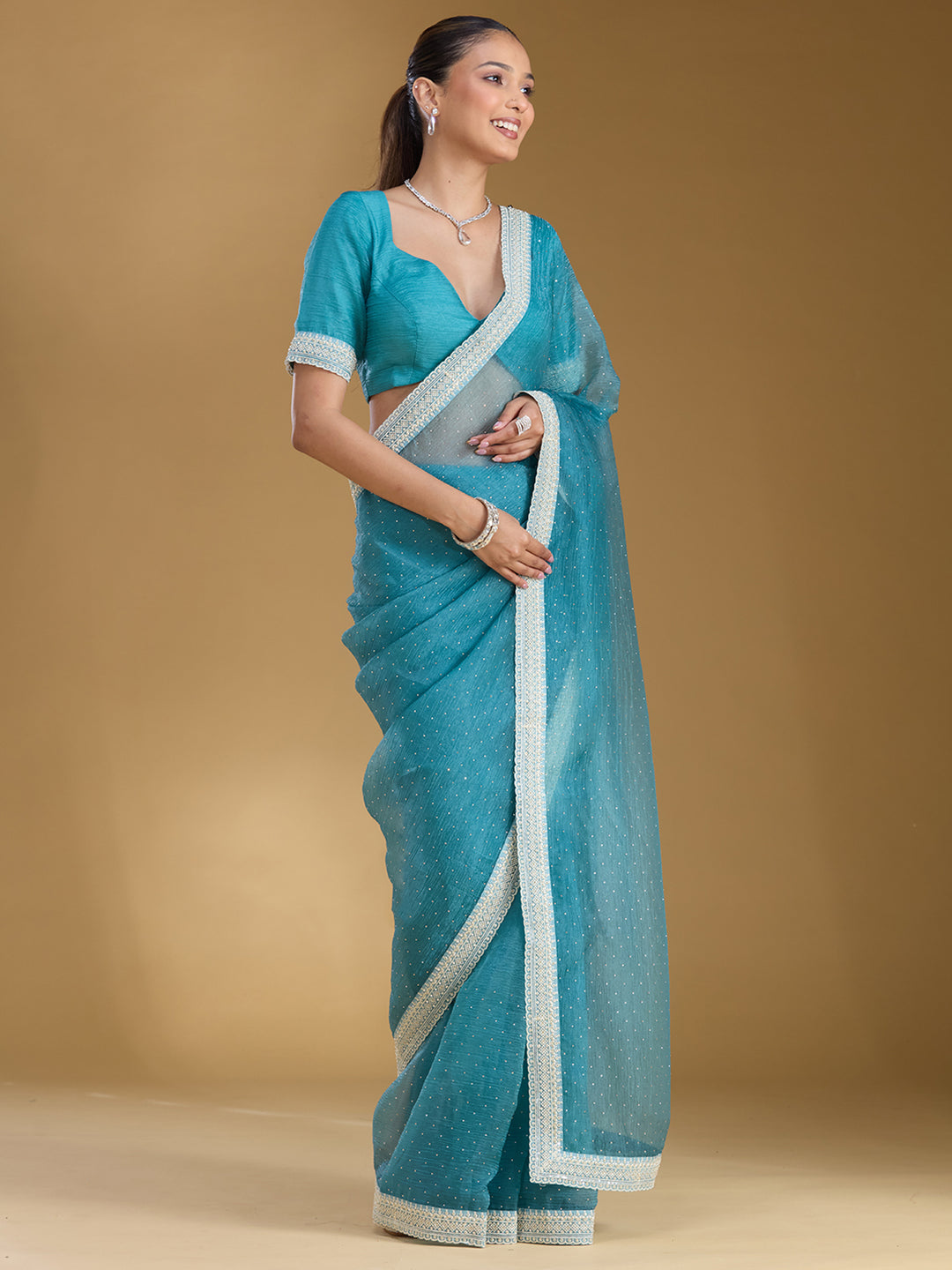 Sky Blue Tissue Gold Zariwork Saree With Matching Blouse Piece