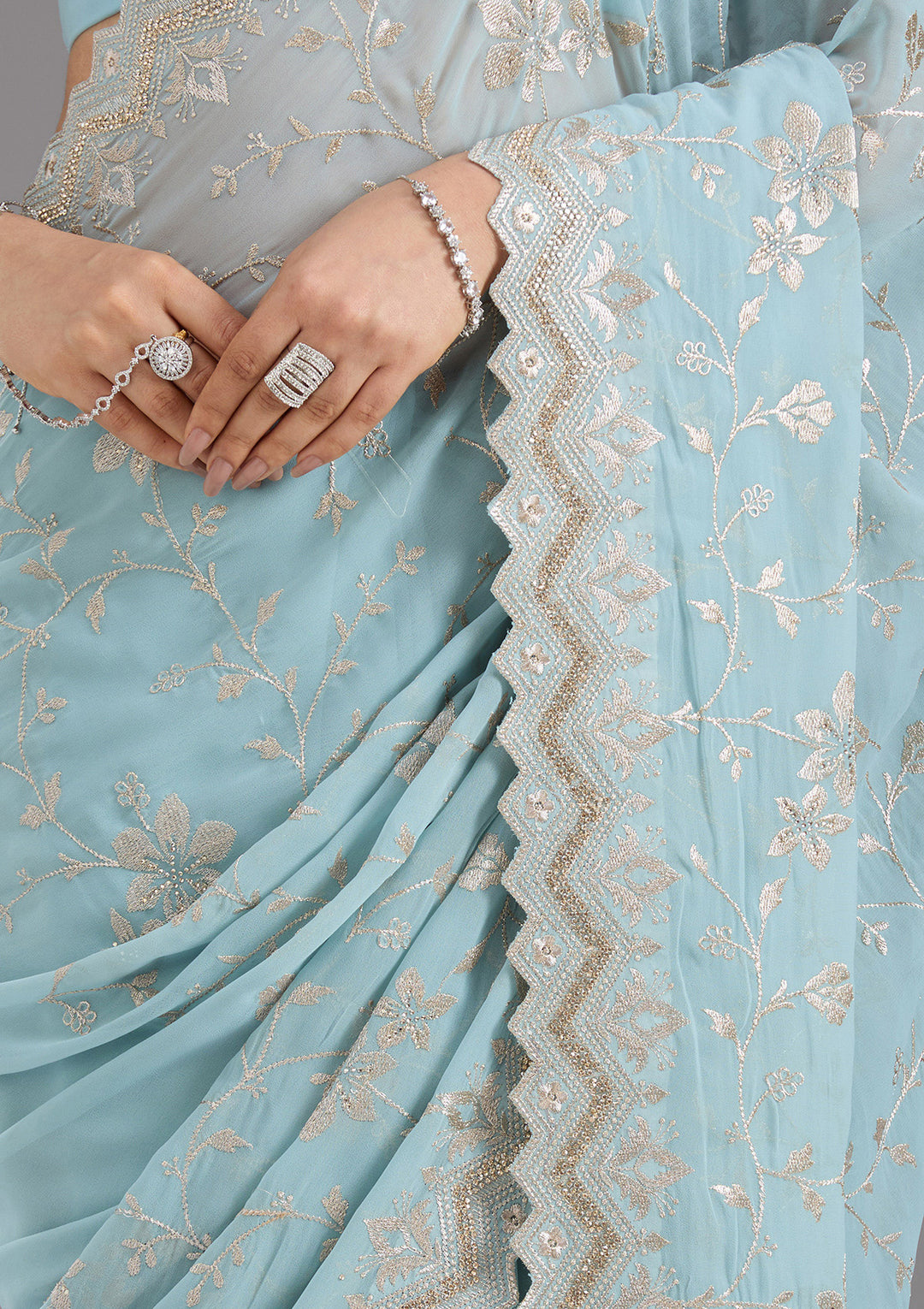 Sky Blue Georgette Gold Zariwork Saree With Matching Blouse Piece