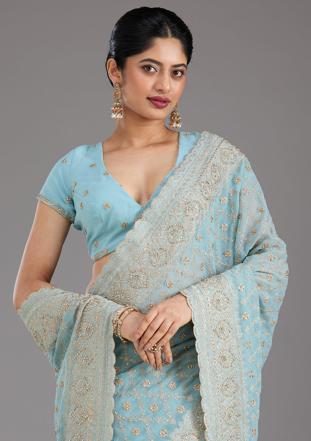 Sky Blue Georgette Gold Zariwork Saree With Matching Blouse Piece