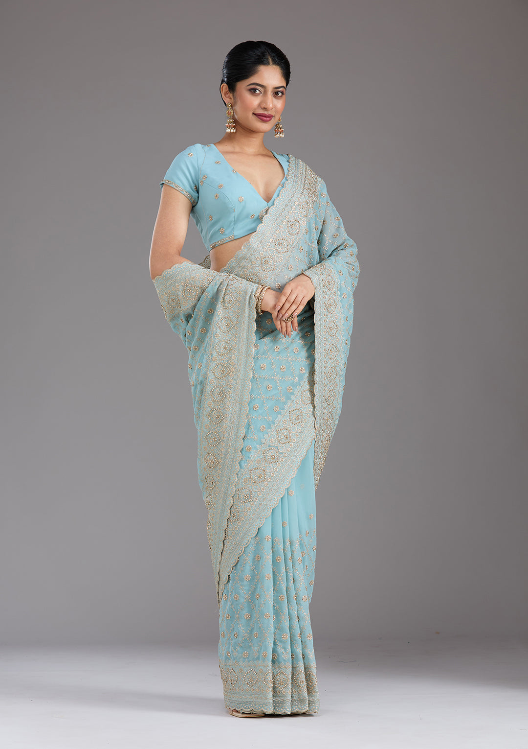 Sky Blue Georgette Gold Zariwork Saree With Matching Blouse Piece