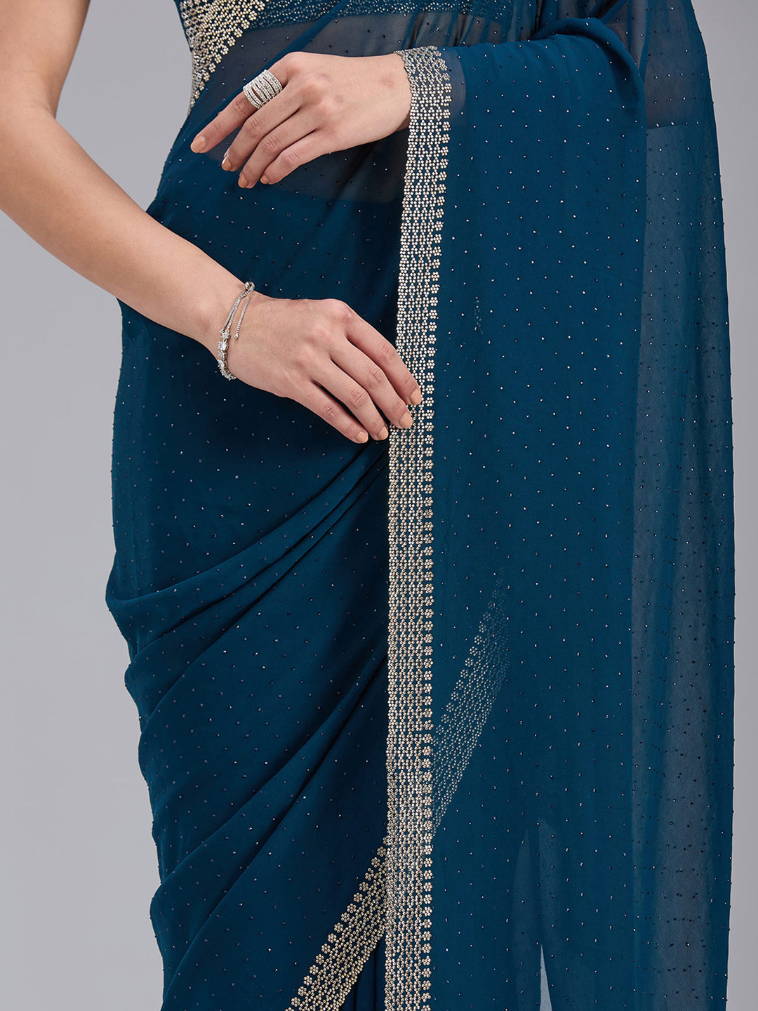 Peacock Blue Georgette Gold Stonework Saree With Matching Blouse Piece