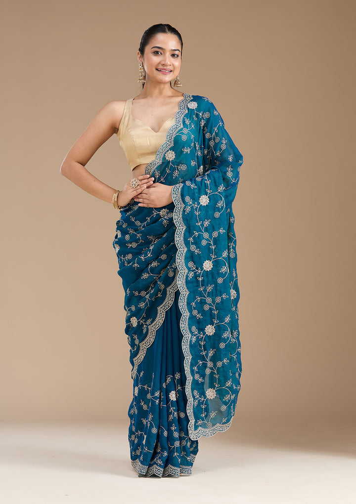 Peacock Blue Georgette Gold Zariwork Saree With Matching Blouse Piece