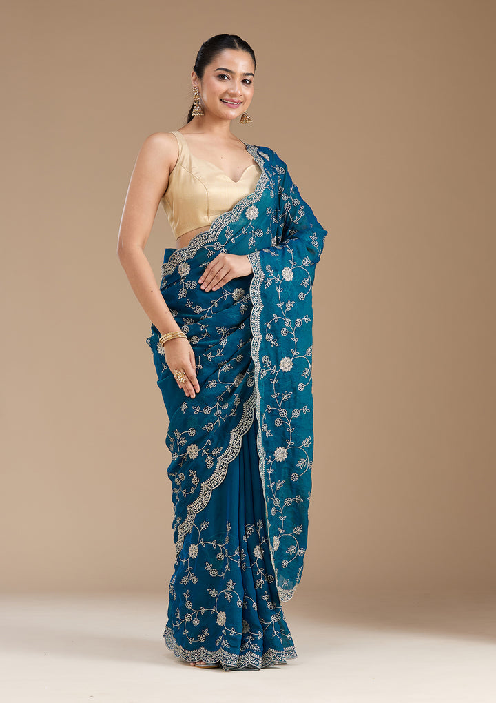 Peacock Blue Georgette Gold Zariwork Saree With Matching Blouse Piece