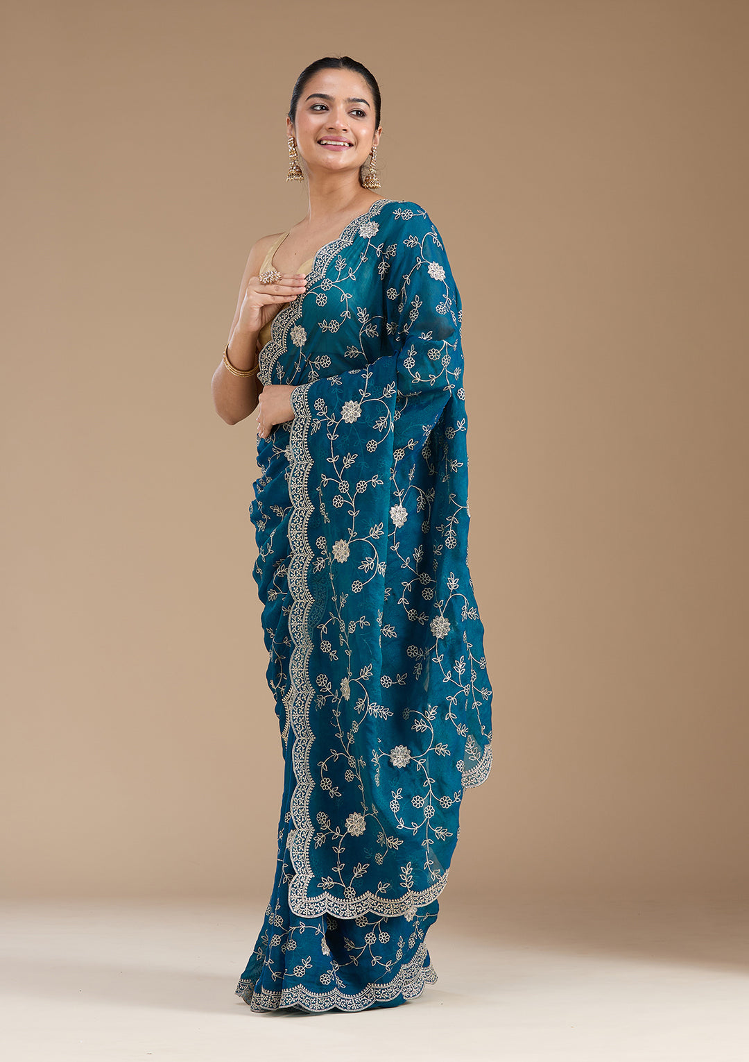 Peacock Blue Georgette Gold Zariwork Saree With Matching Blouse Piece