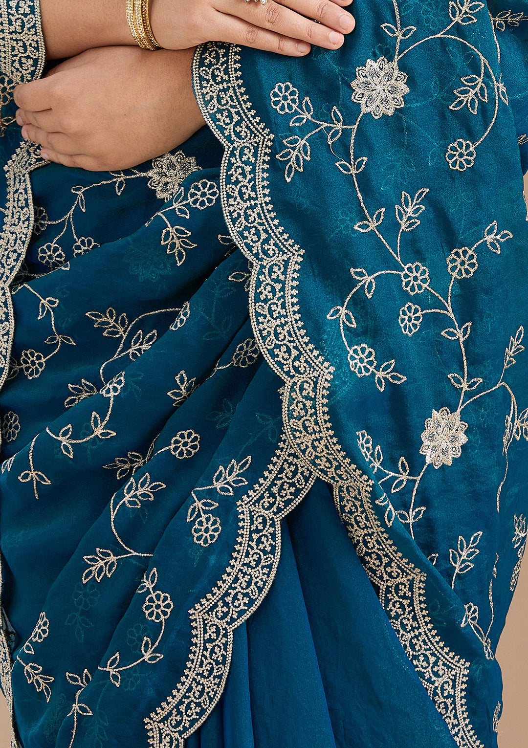 Peacock Blue Georgette Gold Zariwork Saree With Matching Blouse Piece