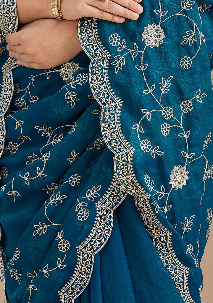 Peacock Blue Georgette Gold Zariwork Saree With Matching Blouse Piece