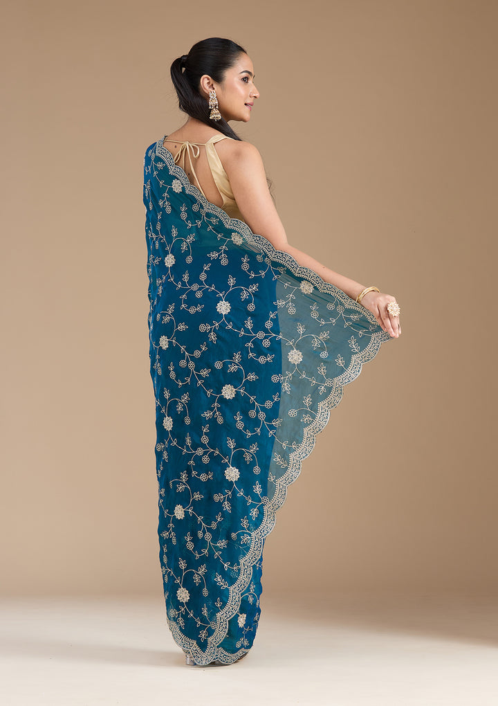 Peacock Blue Georgette Gold Zariwork Saree With Matching Blouse Piece