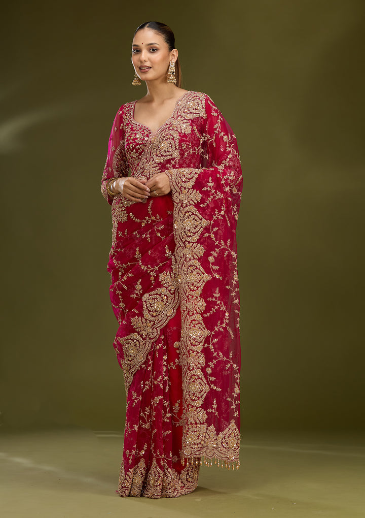 Rani Pink Net Gold Zariwork Saree With Matching Blouse Piece