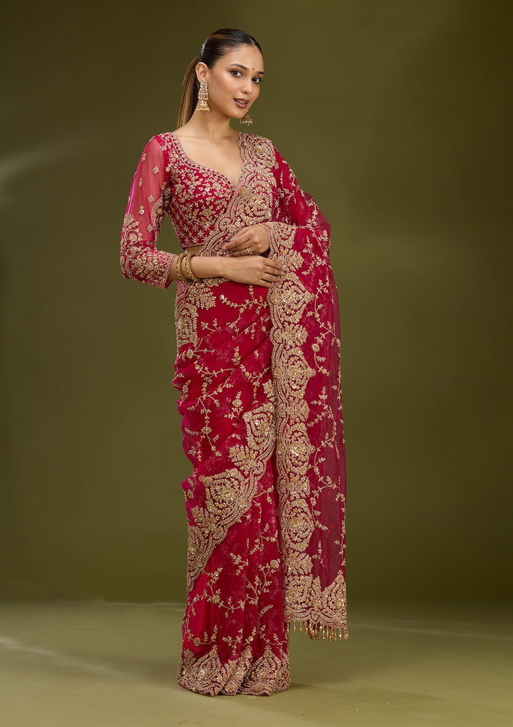 Rani Pink Net Gold Zariwork Saree With Matching Blouse Piece
