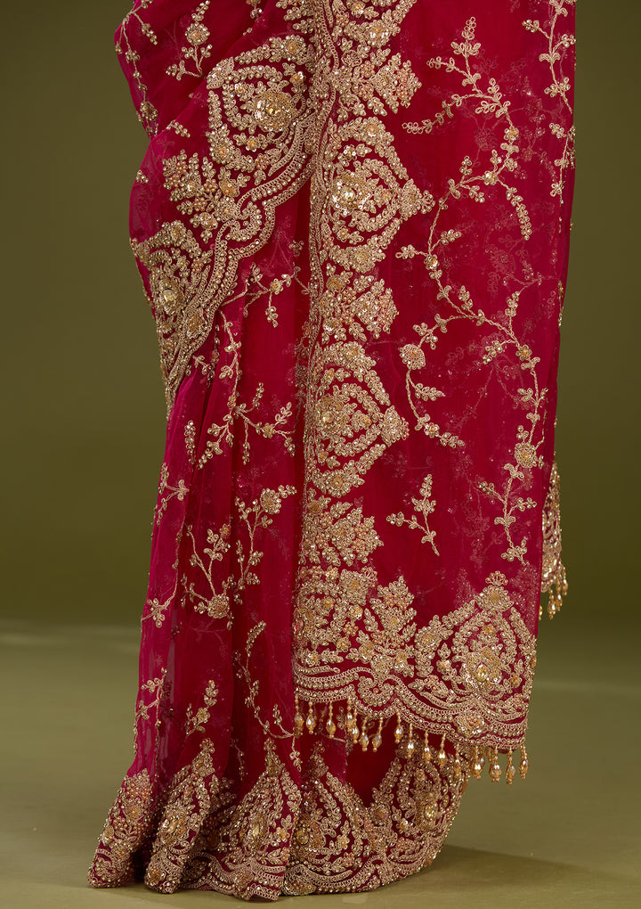 Rani Pink Net Gold Zariwork Saree With Matching Blouse Piece