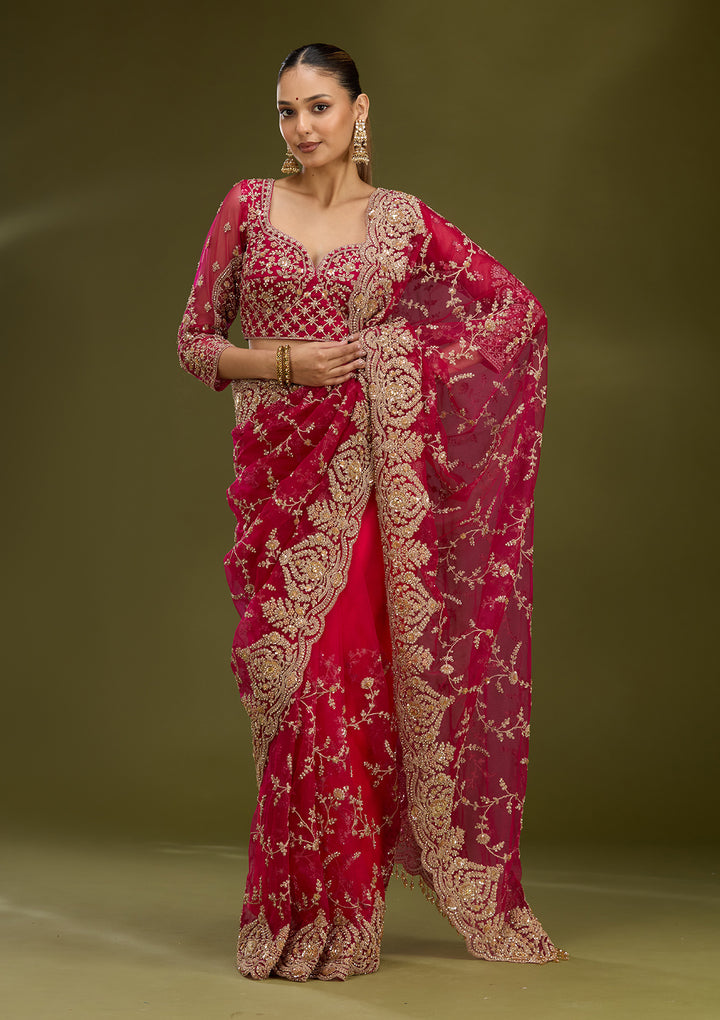 Rani Pink Net Gold Zariwork Saree With Matching Blouse Piece