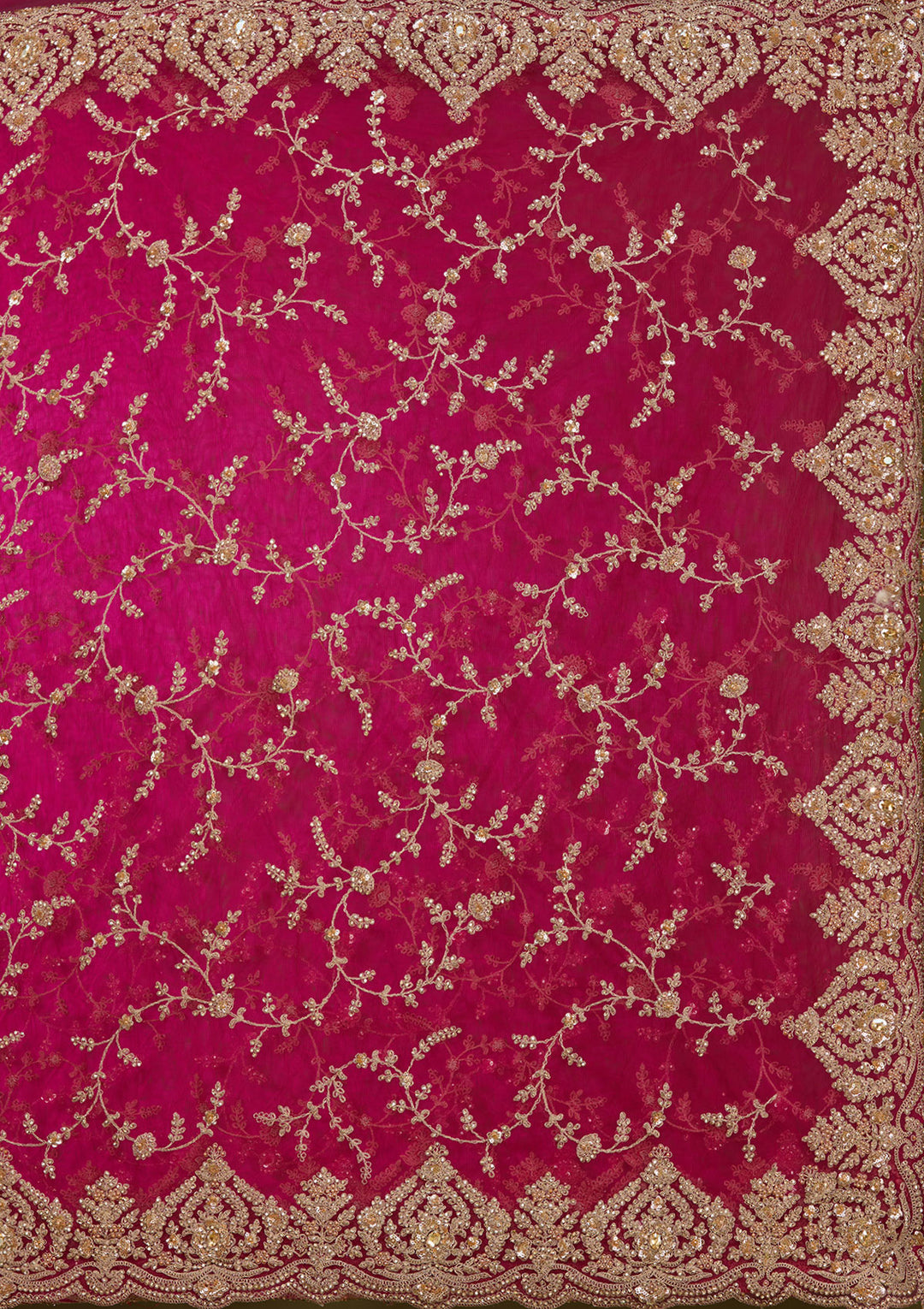 Rani Pink Net Gold Zariwork Saree With Matching Blouse Piece