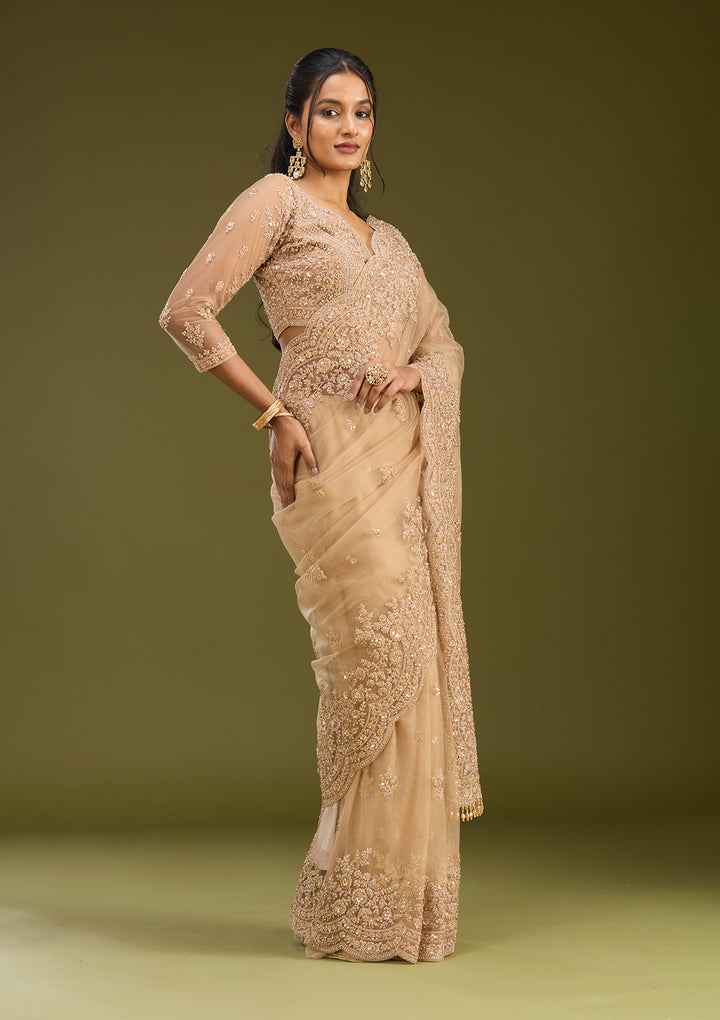 Beige Net Gold Zariwork Saree With Matching Blouse Piece