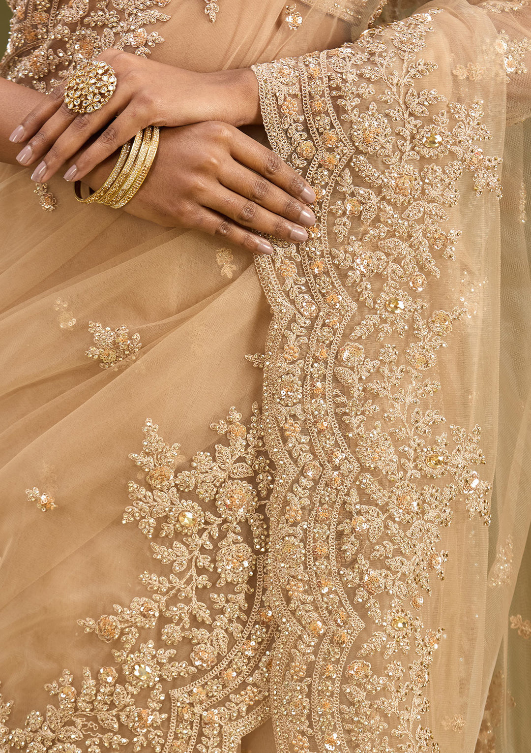 Beige Net Gold Zariwork Saree With Matching Blouse Piece
