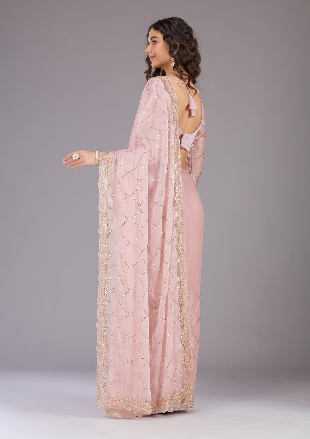 Pink Tissue Sequins Saree With Matching Blouse Piece