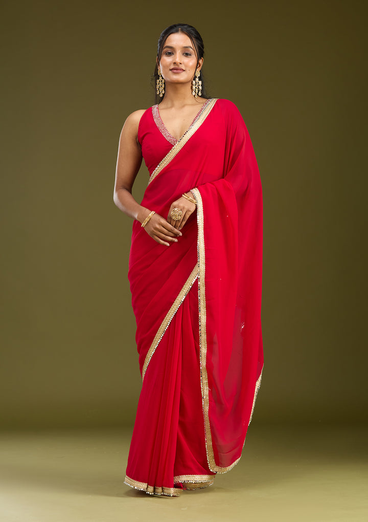 Rani Pink Georgette Mirrorwork Saree With Matching Blouse Piece