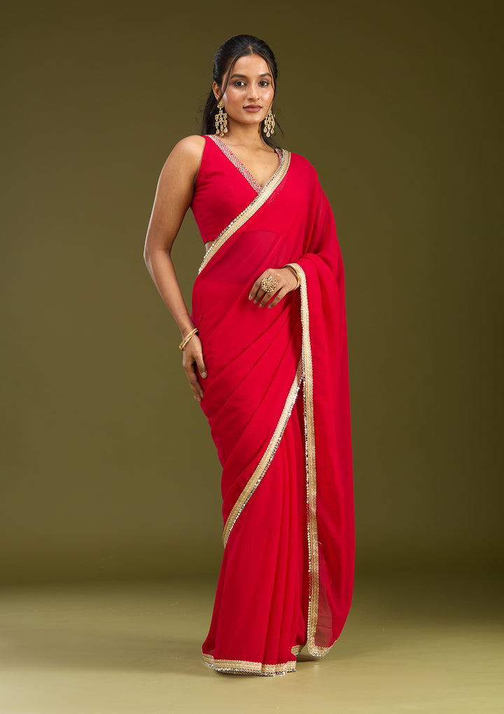 Rani Pink Georgette Mirrorwork Saree With Matching Blouse Piece
